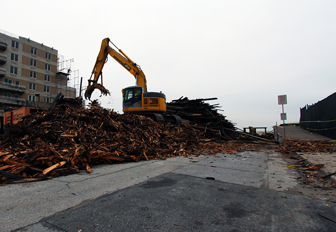 Processing debris at Long Beach, NY Boardwalk, 2013